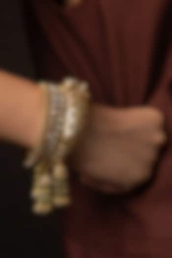 Antique Gold Finish Kundan Polki Bangles (Set Of 2) by Preeti Mohan at Pernia's Pop Up Shop