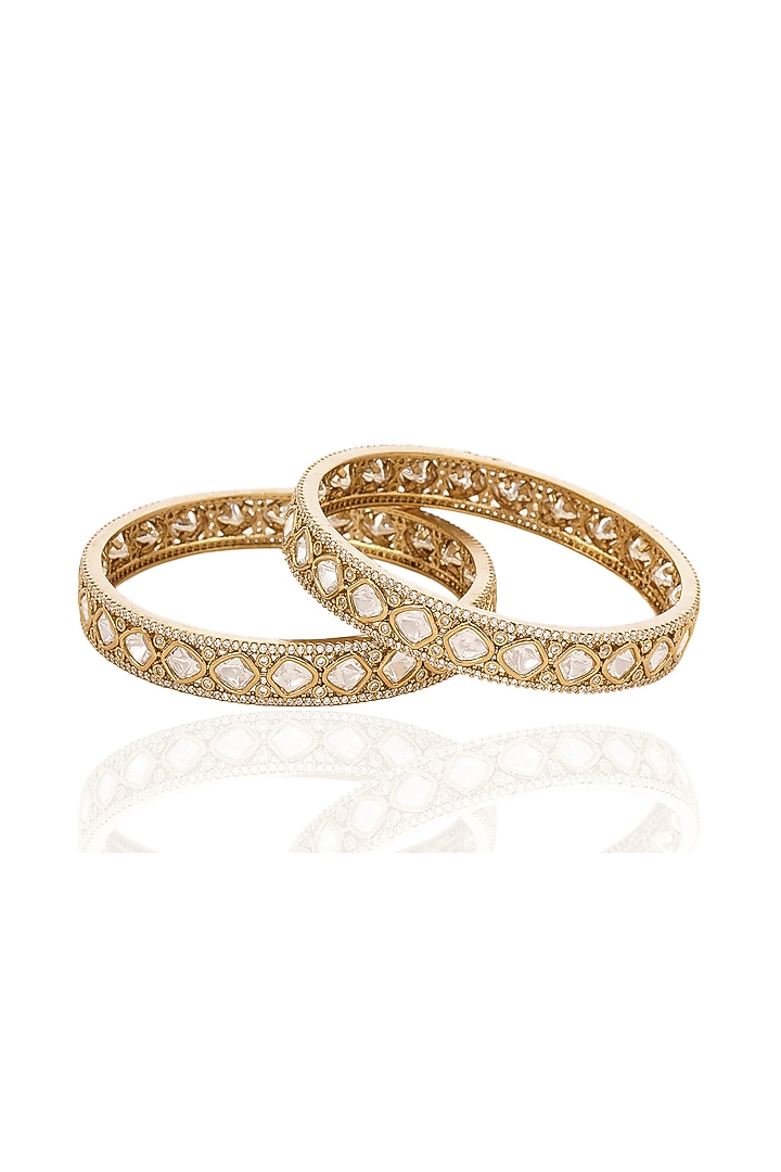 Antique Gold Finish Kundan Polki Bangles (Set Of 2) by Preeti Mohan at Pernia's Pop Up Shop