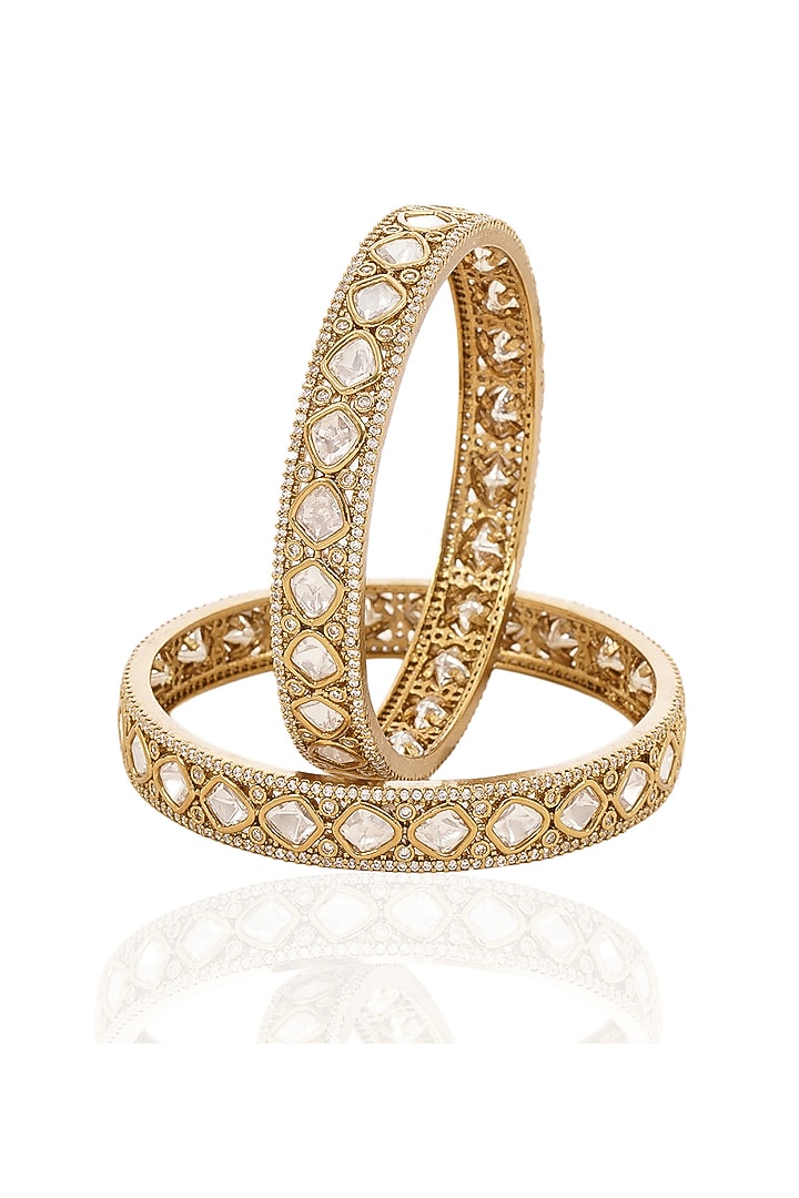 Antique Gold Finish Kundan Polki Bangles (Set Of 2) by Preeti Mohan at Pernia's Pop Up Shop