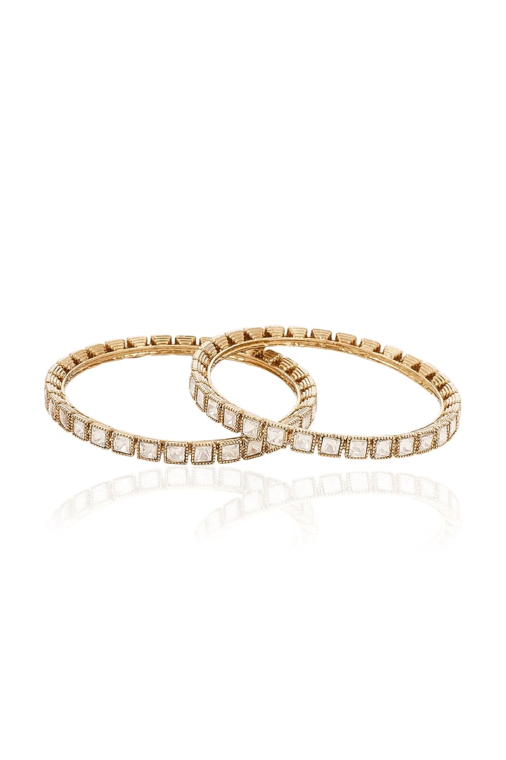 Antique Gold Finish Kundan Polki Bangles (Set Of 2) by Preeti Mohan at Pernia's Pop Up Shop