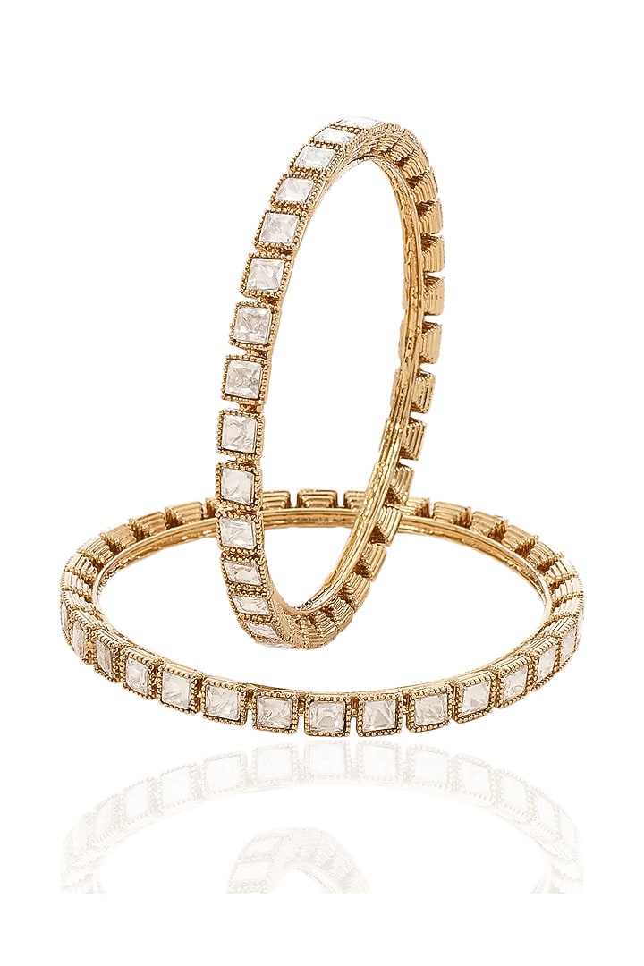Antique Gold Finish Kundan Polki Bangles (Set Of 2) by Preeti Mohan at Pernia's Pop Up Shop