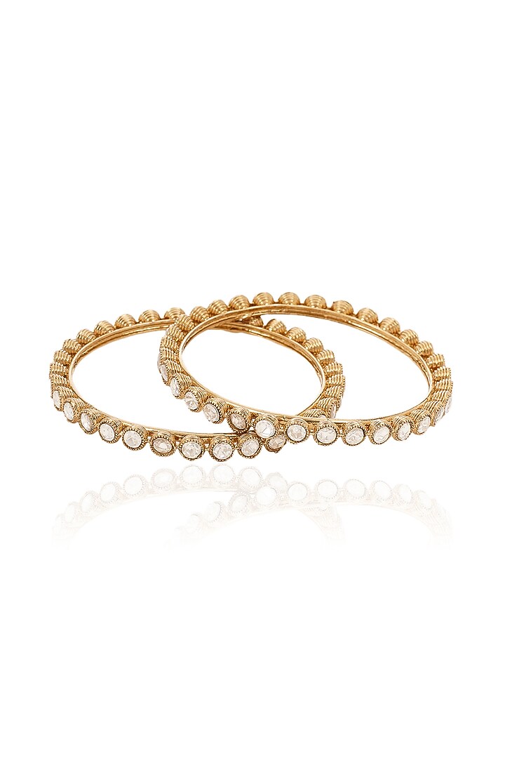 Antique Gold Finish Kundan Polki Bangles (Set Of 2) by Preeti Mohan at Pernia's Pop Up Shop