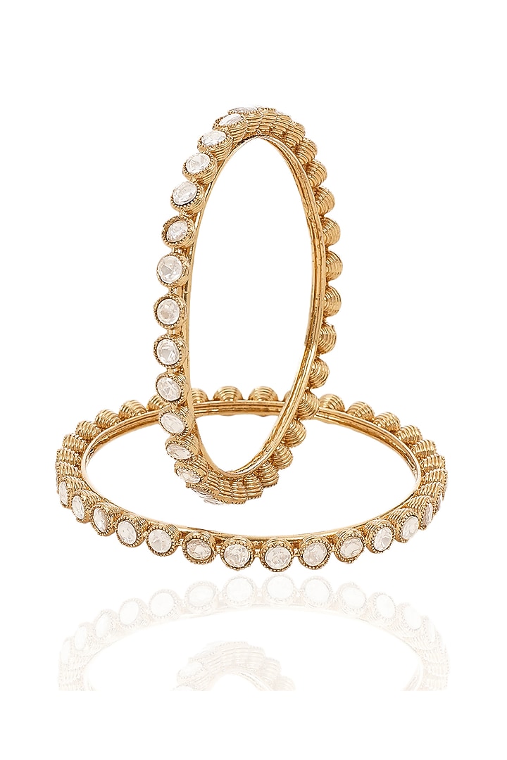Antique Gold Finish Kundan Polki Bangles (Set Of 2) by Preeti Mohan at Pernia's Pop Up Shop