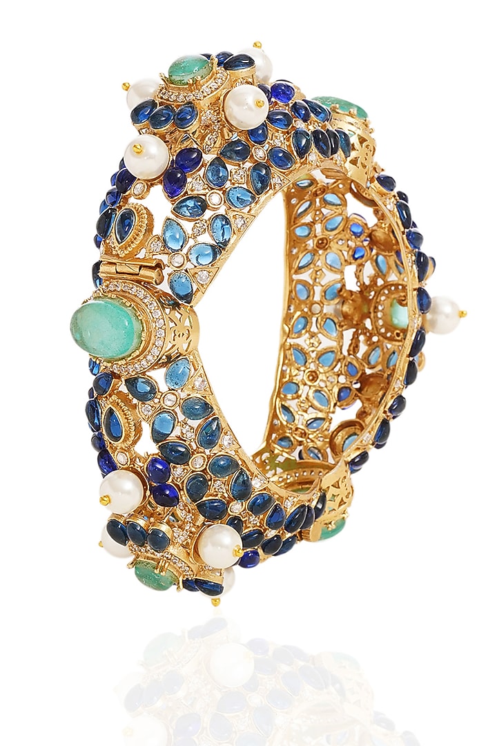 Gold Finish Blue Sapphire Bangle by Preeti Mohan at Pernia's Pop Up Shop