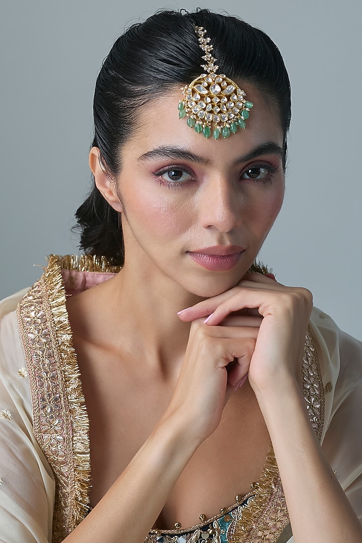 Gold Finish Kundan Polki & Green Stone Maangtikka In Sterling Silver by Preeti Mohan Silver at Pernia's Pop Up Shop