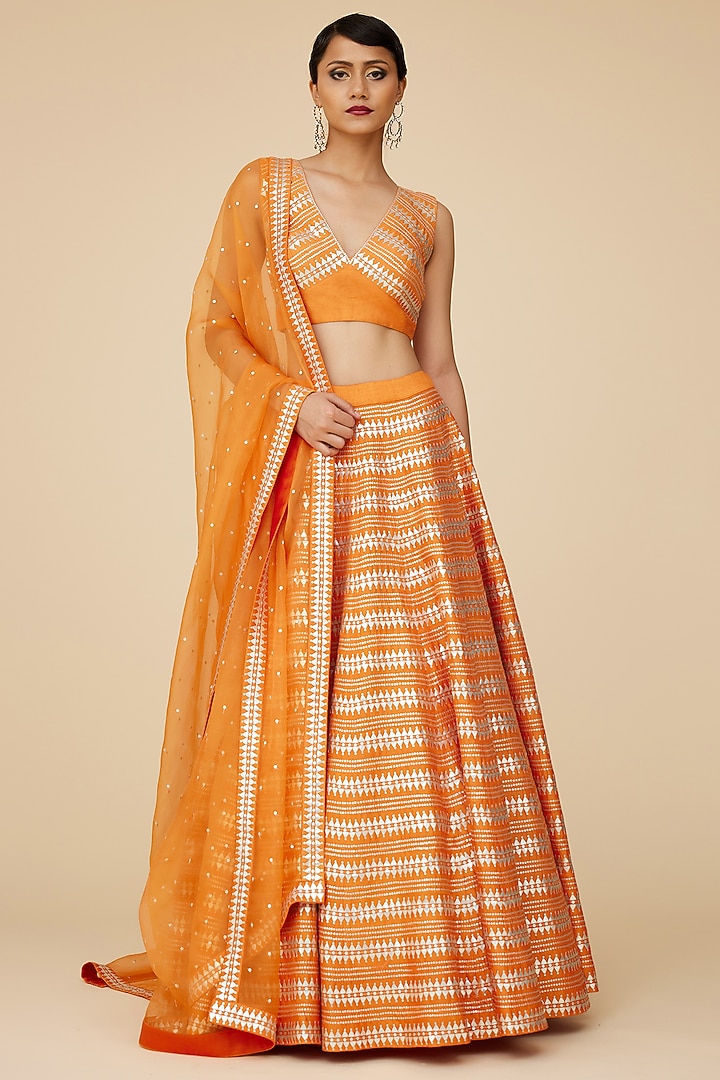 Pumpkin Orange Raw Silk Aari Embroidered Wedding Lehenga Set by Priyal Prakash at Pernia's Pop Up Shop
