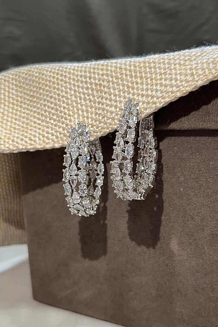 White Finish Zircon Hoop Earrings by Prestones at Pernia's Pop Up Shop