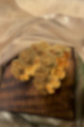 Antique Gold Finish Goddess Lakshmi Motif Temple Bangles (Set Of 2) by Prestones at Pernia's Pop Up Shop