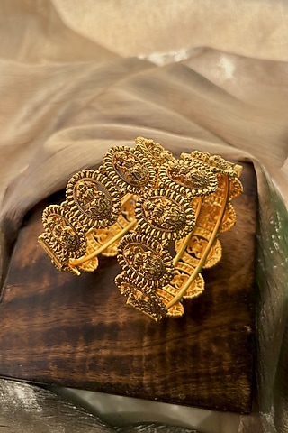 Antique Gold Finish Goddess Lakshmi Motif Temple Bangles (Set Of 2) by Prestones