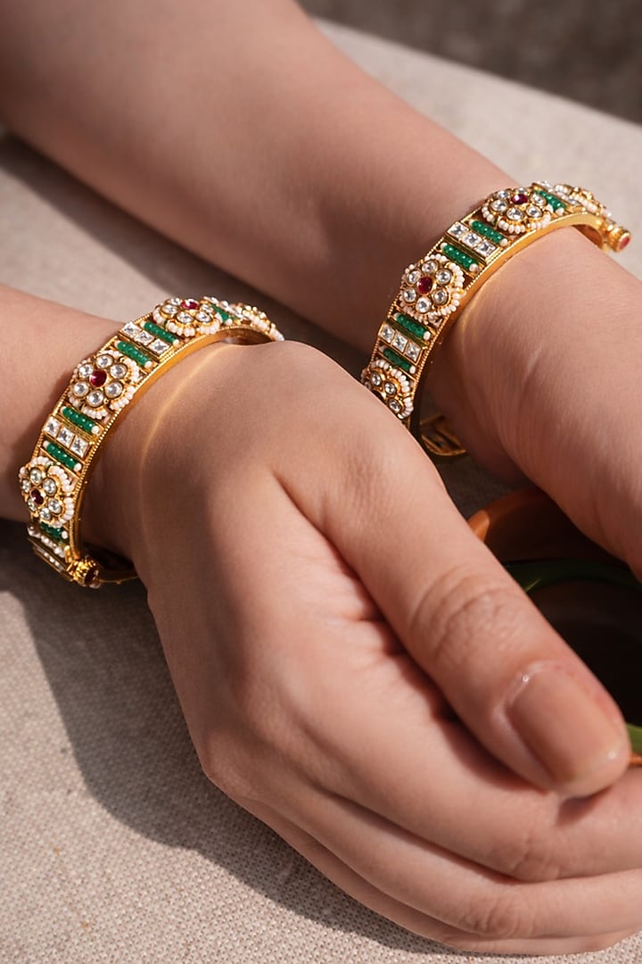 Antique Gold Finish Emerald Temple Bangles (Set Of 2) by Prestones at Pernia's Pop Up Shop