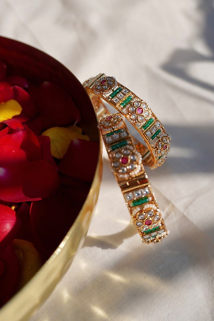 Antique Gold Finish Emerald Temple Bangles (Set Of 2) by Prestones at Pernia's Pop Up Shop