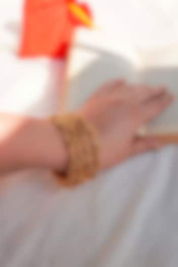 Antique Gold Finish Ghungroo Temple Bangles (Set Of 4) by Prestones at Pernia's Pop Up Shop