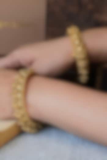 Antique Gold Finish Temple Bangles (Set of 2) by Prestones at Pernia's Pop Up Shop