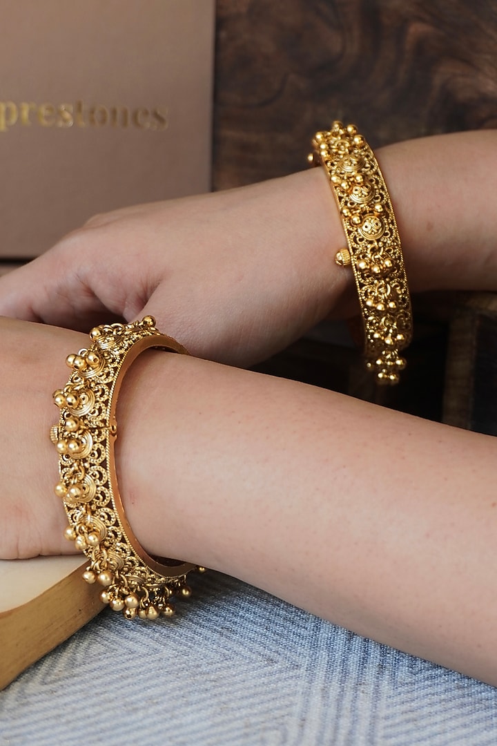Antique Gold Finish Temple Bangles (Set of 2) by Prestones at Pernia's Pop Up Shop