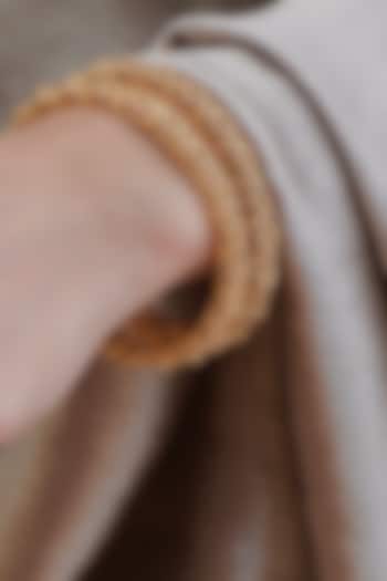 Antique Gold Finish Beadwork Temple Bangles (Set Of 4) by Prestones at Pernia's Pop Up Shop