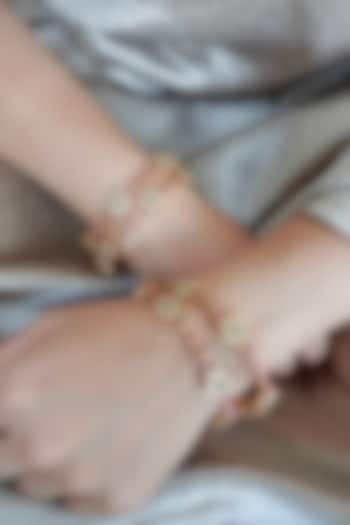 Antique Gold Finish Ruby & Emerald Temple Bangles (Set Of 4) by Prestones at Pernia's Pop Up Shop