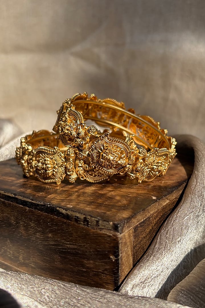 Antique Gold Finish Temple Bangles (Set of 2) by Prestones at Pernia's Pop Up Shop