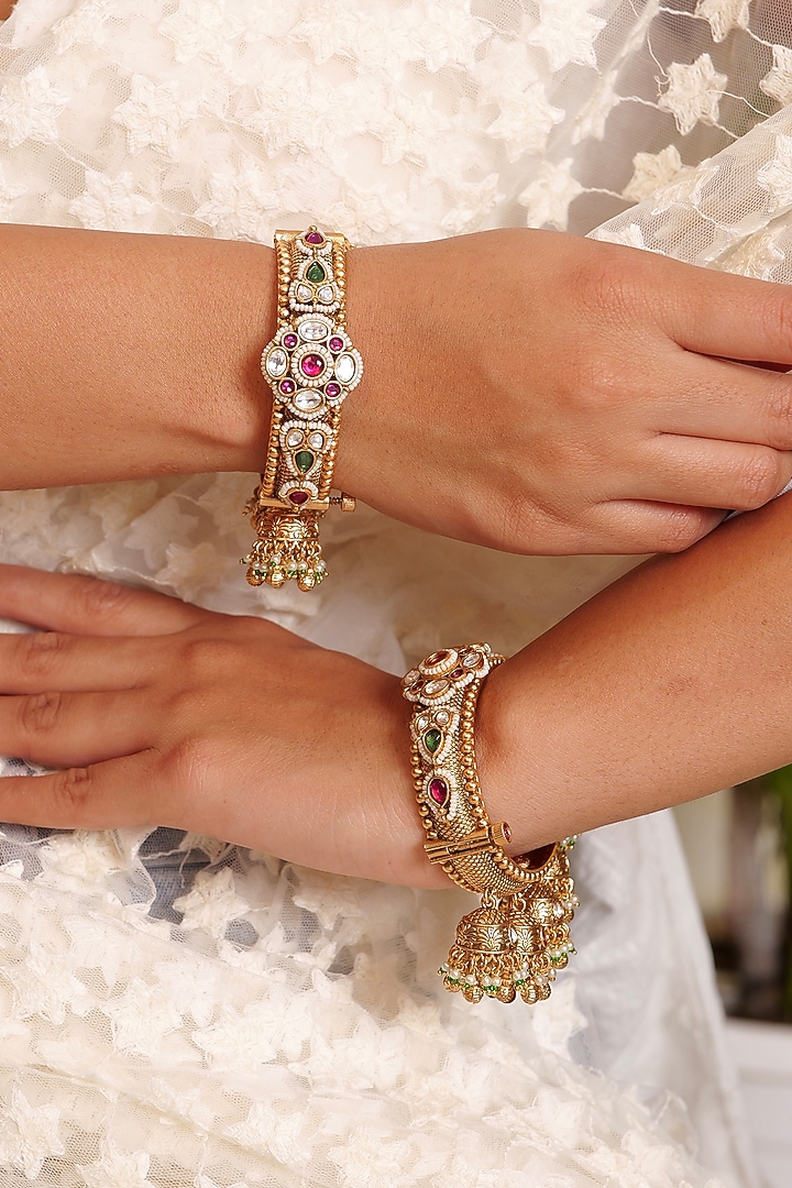 Antique Gold Finish Kundan Polki & Ruby Stone Temple Bangles (Set Of 2) by Prestones at Pernia's Pop Up Shop
