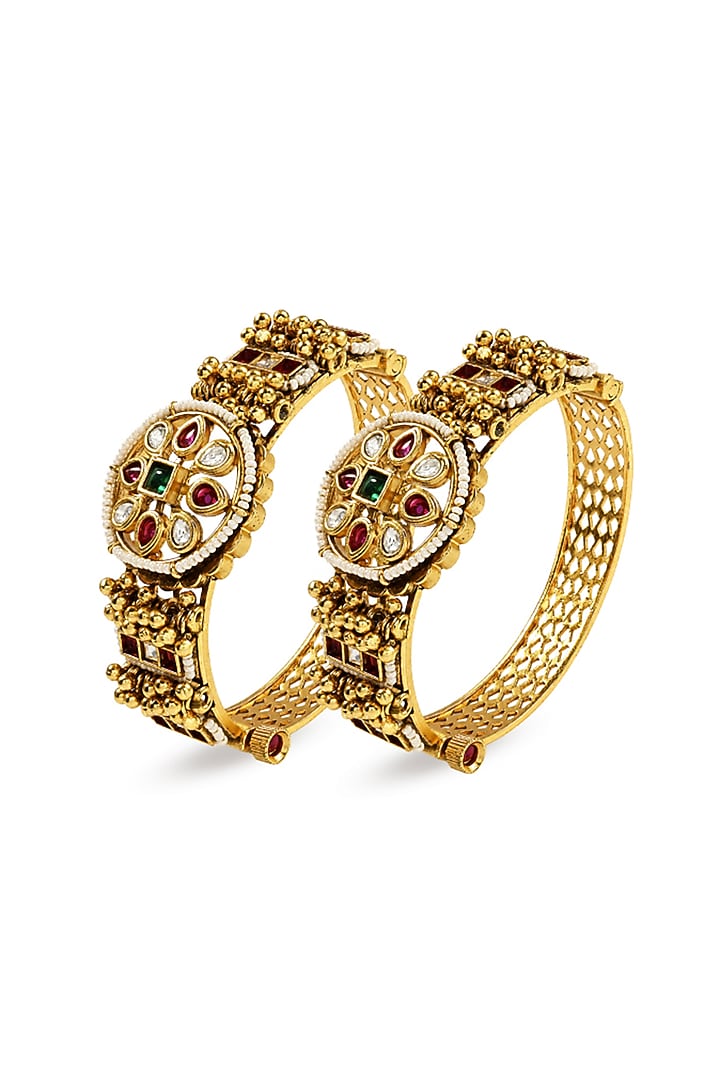 Antique Gold Finish Kundan Polki & Pearl Temple Floral Bangle (Set Of 2) by Prestones at Pernia's Pop Up Shop