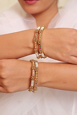 Antique Gold Finish Floral Motifs Textured Temple Bangle (Set Of 4) by Prestones