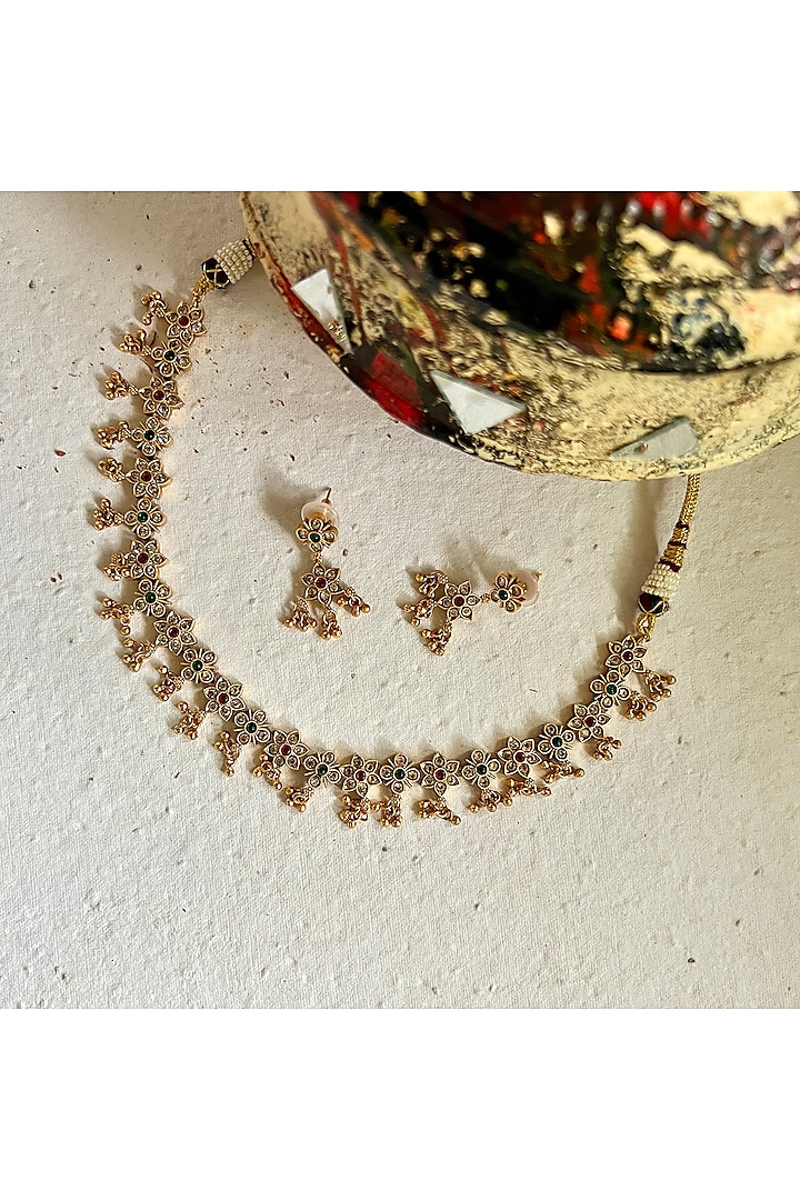 Gold Finish Floral Motif Temple Necklace Set by Prestones at Pernia's Pop Up Shop