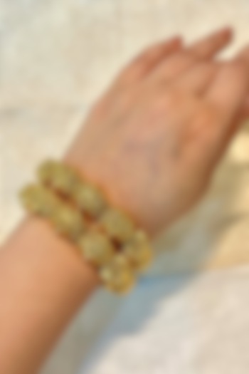 Gold Finish Temple Carved Bangles (Set Of 2) by Prestones at Pernia's Pop Up Shop