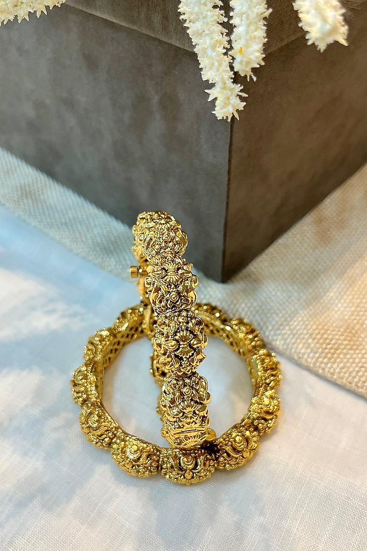 Gold Finish Temple Carved Bangles (Set Of 2) by Prestones at Pernia's Pop Up Shop