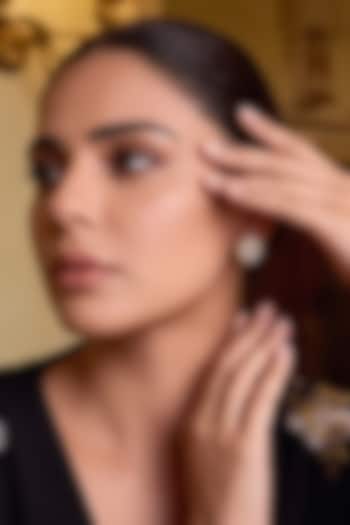 Gold Finish Zircon Stud Earrings by Prestones at Pernia's Pop Up Shop