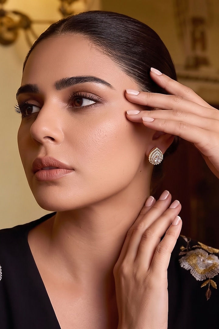 Gold Finish Zircon Stud Earrings by Prestones at Pernia's Pop Up Shop