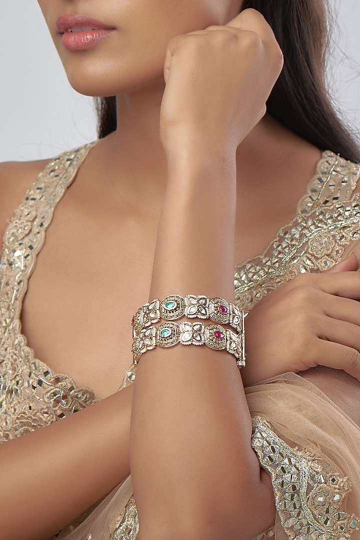 Gold Finish Stone & Pearl Filigree Bangles (Set Of 2) by Prestones at Pernia's Pop Up Shop