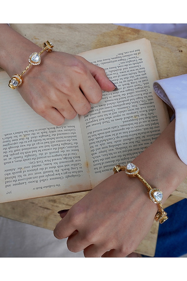 Gold Finish Kundan Polki Bangles (Set Of 2) by Prestones at Pernia's Pop Up Shop