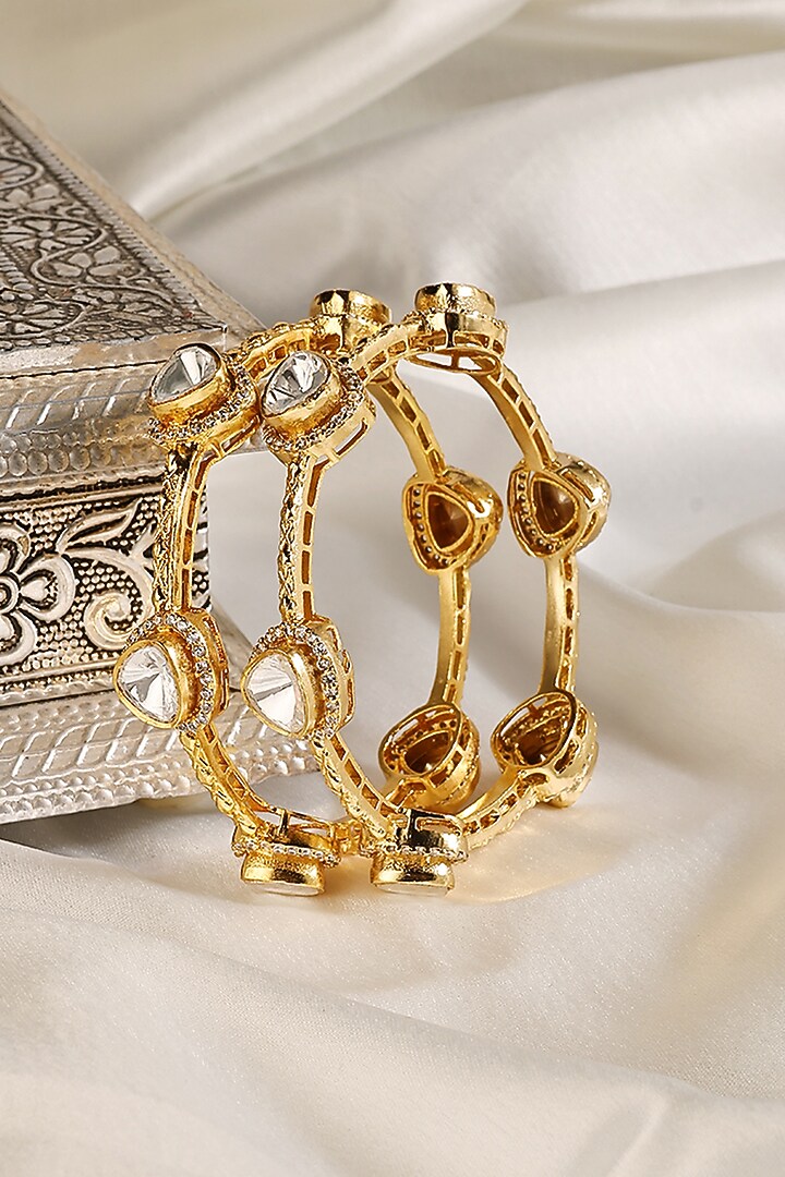Gold Finish Kundan Polki Bangles (Set Of 2) by Prestones at Pernia's Pop Up Shop