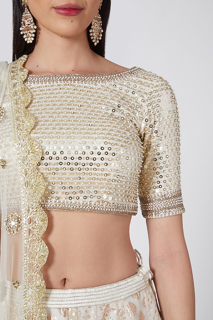 Ivory Embroidered Wedding Lehenga Set by Priyanka Jain at Pernia's Pop Up Shop