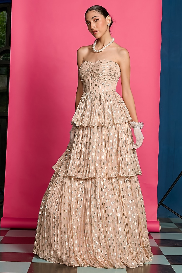 Gold Shimmer Tiered Flared Engagement Gown by Priyanka Jain at Pernia's Pop Up Shop