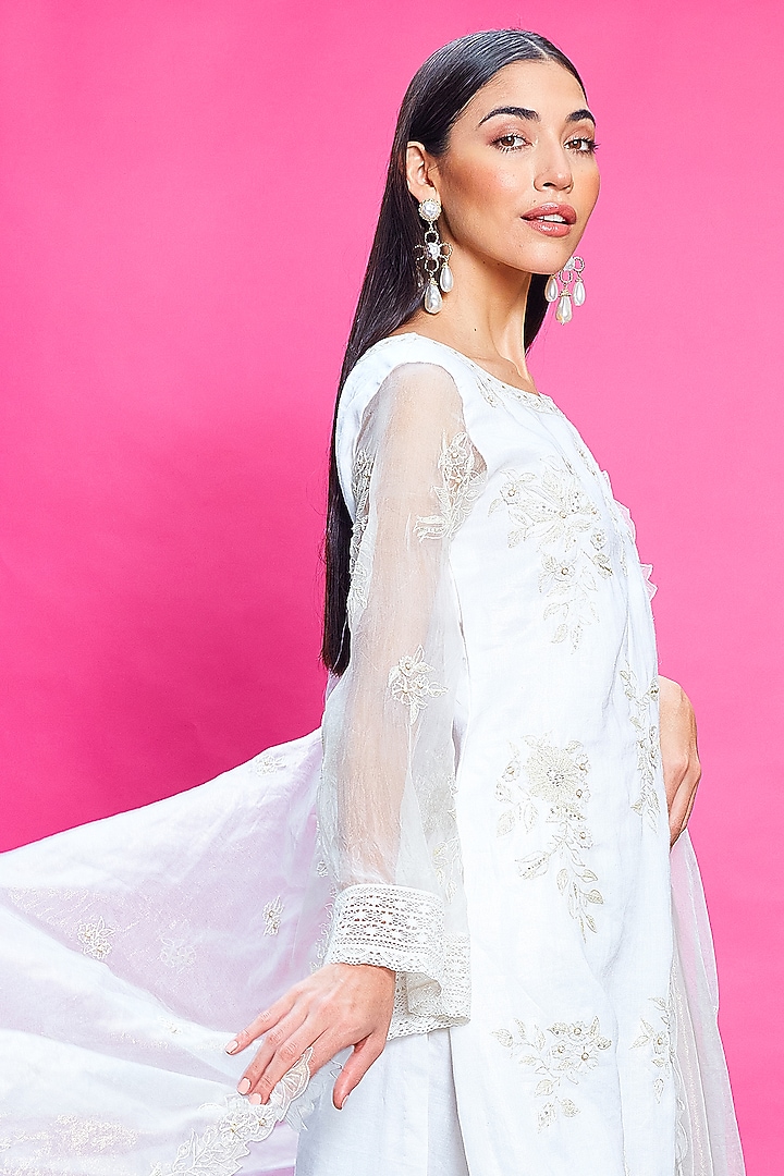 Ivory Linen Embroidered Kurta Set by Priyanka Jain at Pernia's Pop Up Shop