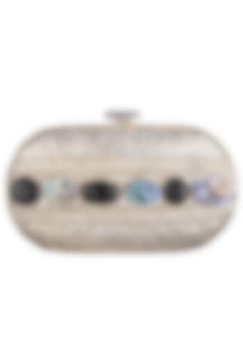 Silver metal embellished capsule clutch bag by PRACCESSORII at Pernia's Pop Up Shop