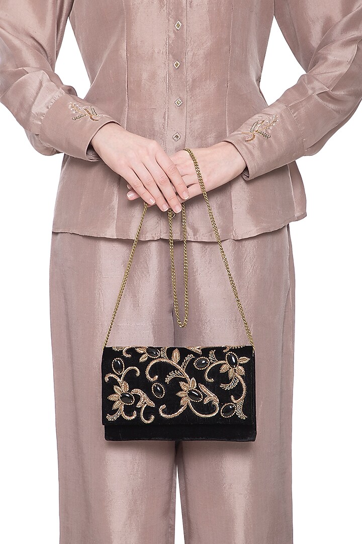 Black embroidered flap over clutch bag by PRACCESSORII at Pernia's Pop Up Shop