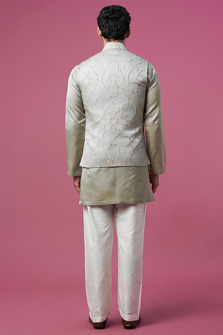 Green Jacquard Asymmetric Bundi Jacket Set by Prima Czar at Pernia's Pop Up Shop