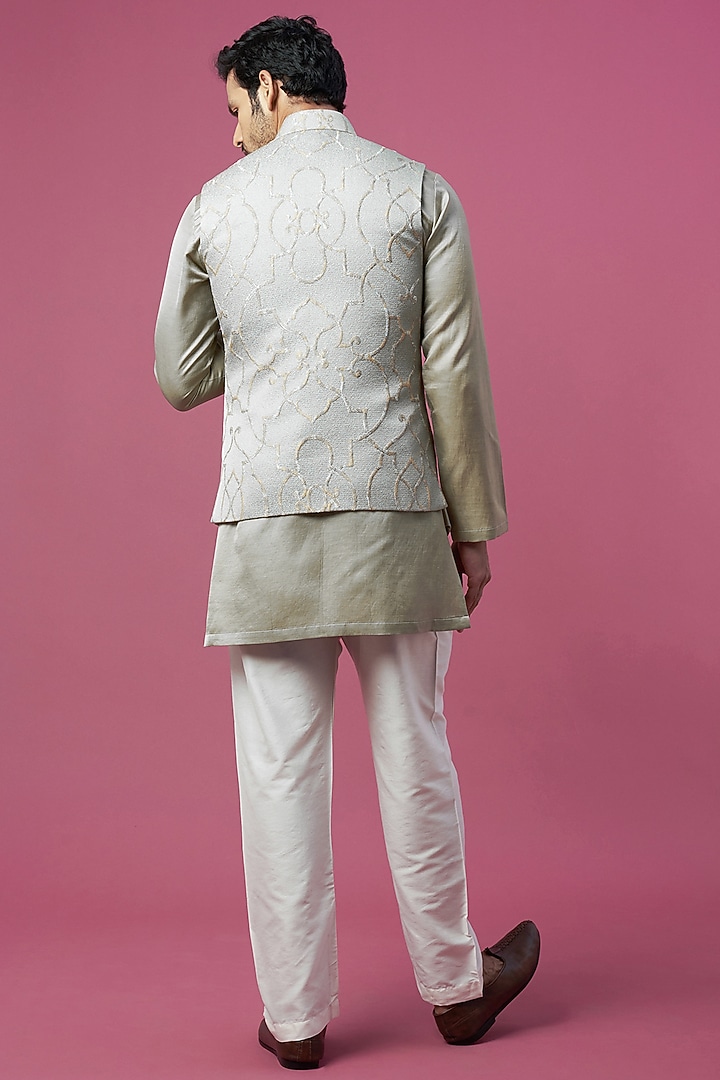 Green Jacquard Asymmetric Bundi Jacket Set by Prima Czar at Pernia's Pop Up Shop