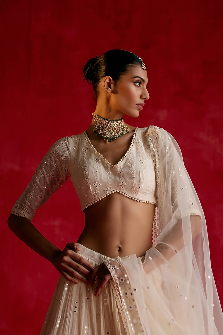 Off-White Cotton Mulmul Mirror & Thread Work Wedding Lehenga Set by PREEVIN at Pernia's Pop Up Shop