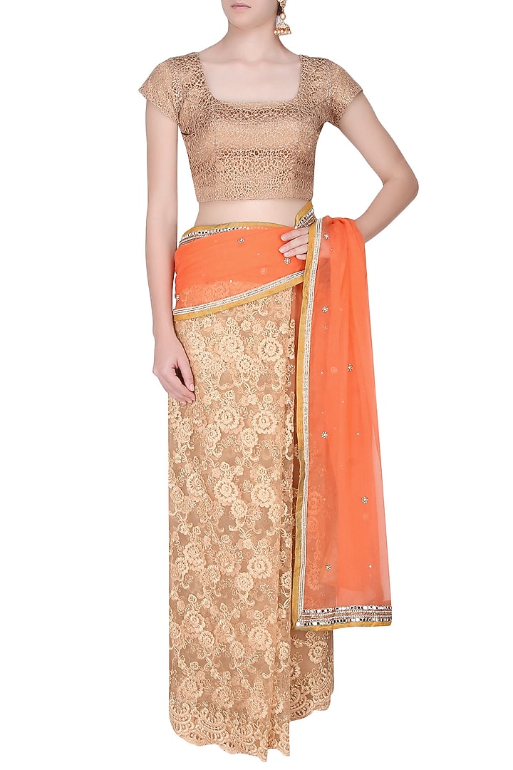 Priti Sahni presents Orange and gold zardozi hand embroidered saree available only at Pernia's Pop Up Shop.