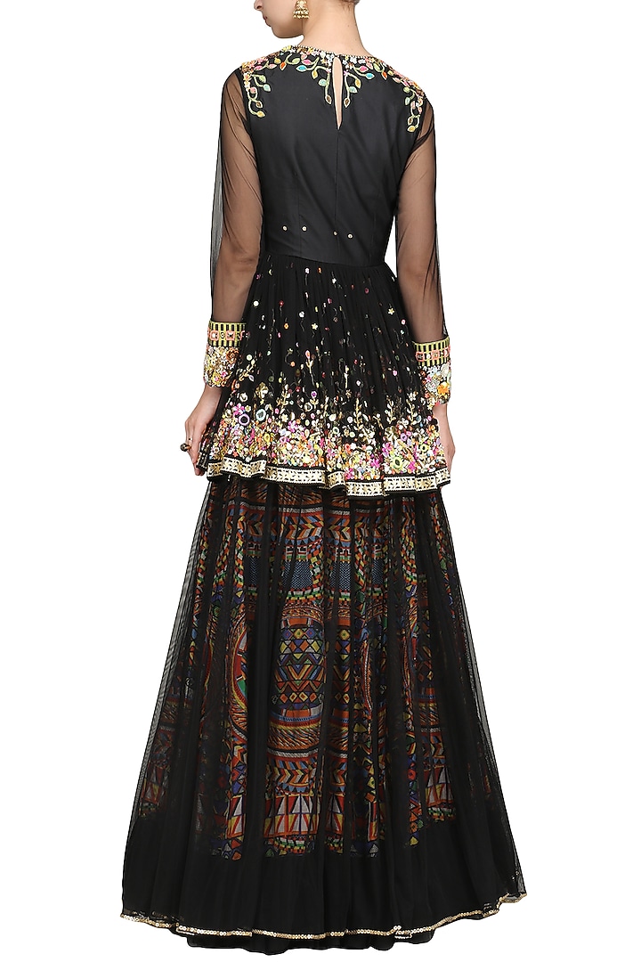 Black embroidered top with layered skirt available only at Pernia's Pop Up Shop.