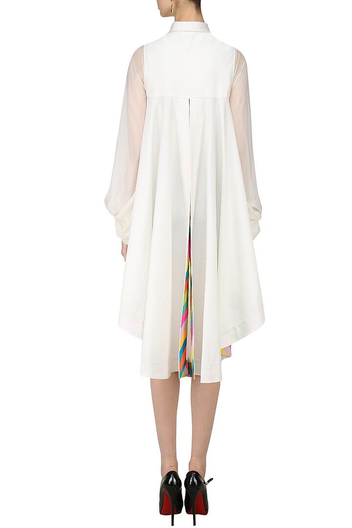 White facing detailed high low dress available only at Pernia's Pop Up Shop.