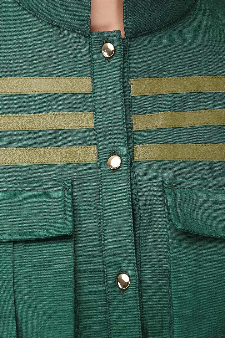 Green faux leather stripe work shirt available only at Pernia's Pop Up Shop.