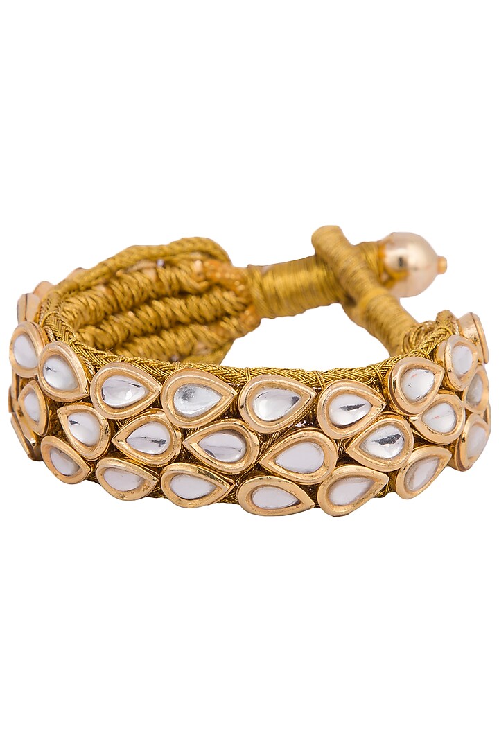 Gold plated 3 line kundan and zari bracelet by Parure