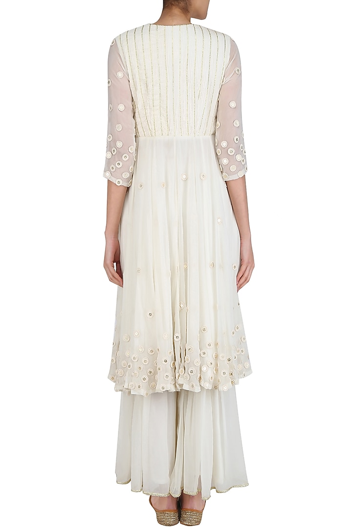 Ivory embroidered agrakha style kurta and sharara pants set available only at Pernia's Pop Up Shop.