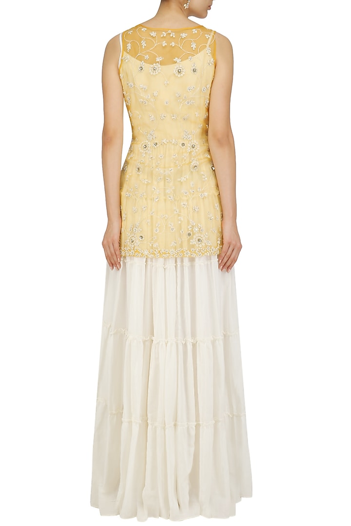 Off white maxi dress and gold floral work jacket set available only at Pernia's Pop Up Shop.