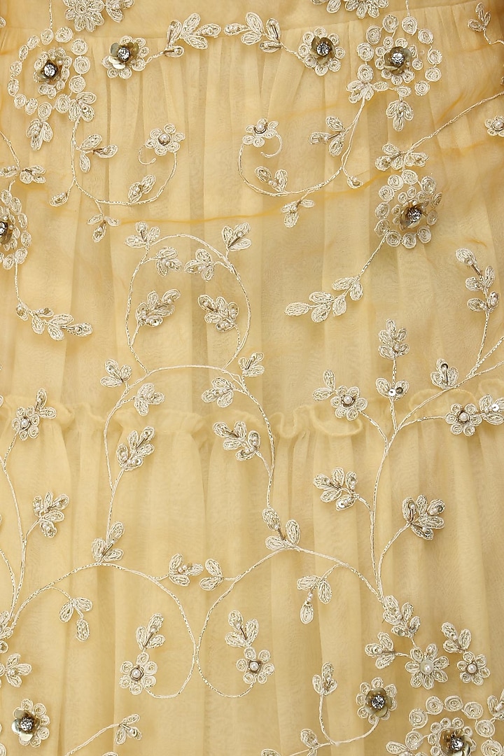 Off white maxi dress and gold floral work jacket set available only at Pernia's Pop Up Shop.