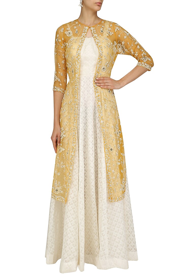 Ivory maxi dress with mustard embroidered jacket available only at Pernia's Pop Up Shop.
