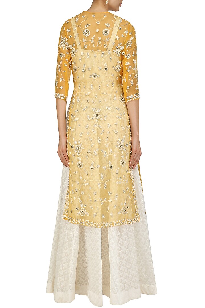 Ivory maxi dress with mustard embroidered jacket available only at Pernia's Pop Up Shop.